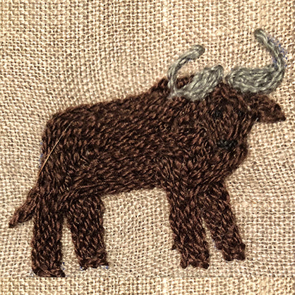 Embroidered African buffalo on Big Five serviette collection