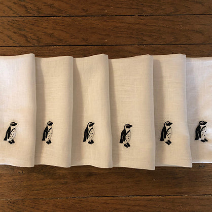 Set of six serviettes in black and white featuring the African pengiun